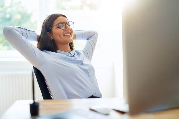 easy website management serivices relaxed smiling business owner with easy website maintenance
